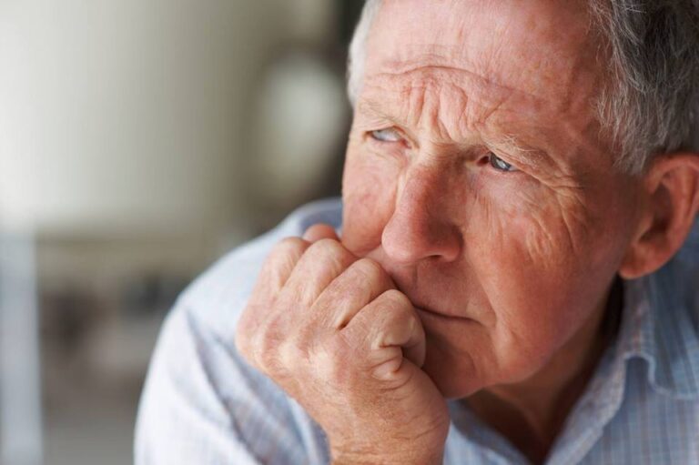 Senior man concerned about peripheral neuropathy.