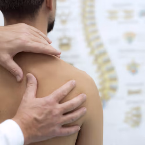 Doctor doing an examination on a male patient